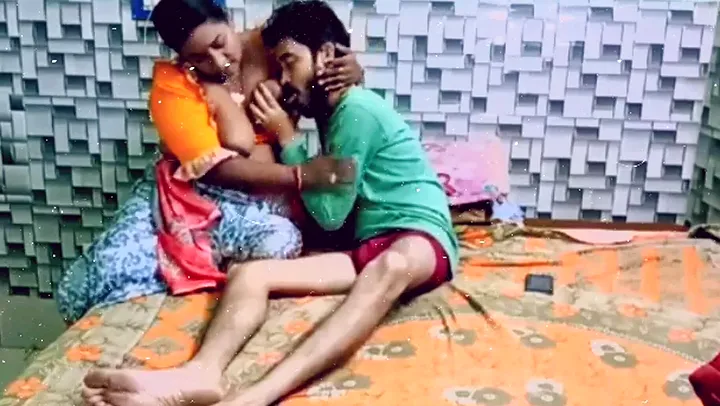 Mature Indian MILF with huge tits gets fucked by two young studs